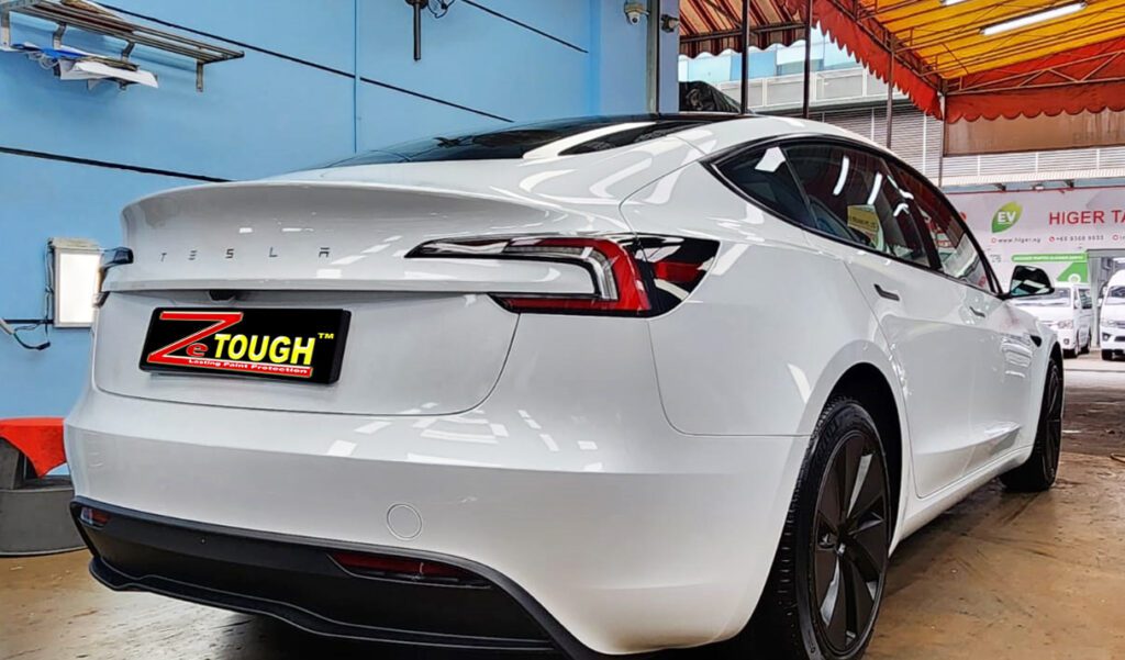 Front three-quarter view of the Tesla Model 3 after coating.