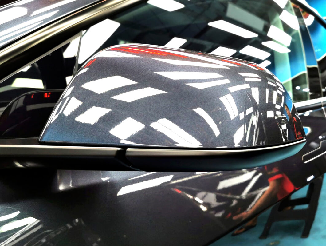 Side panel of the Tesla Model 3 with the ceramic finish locked in.