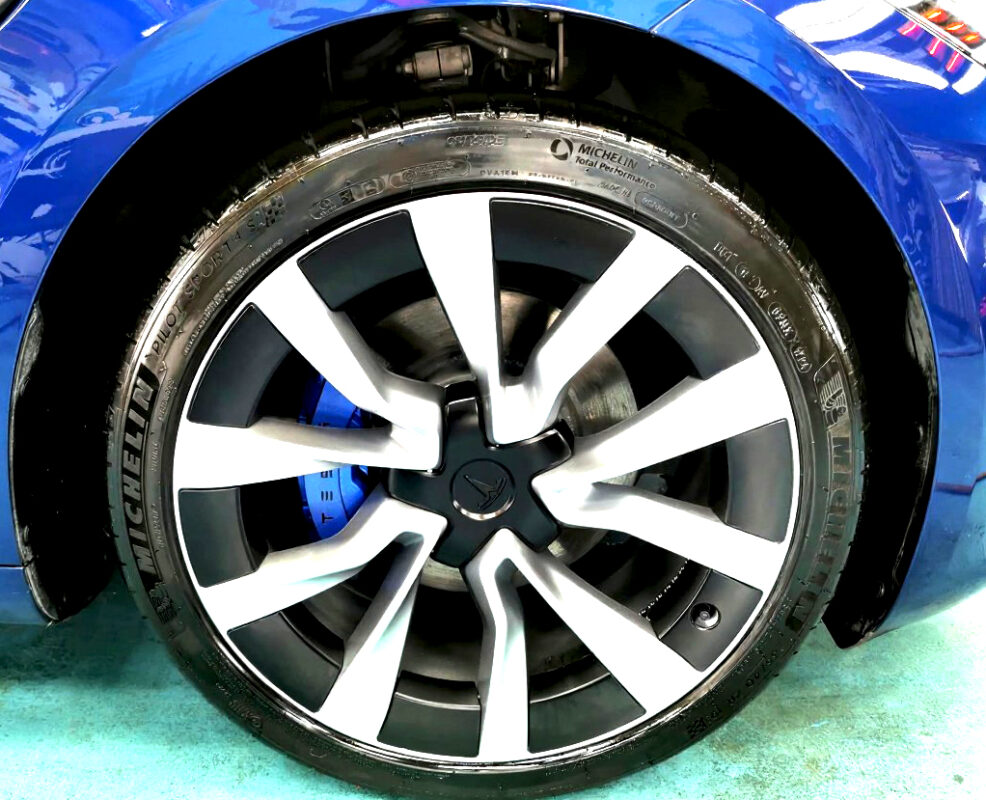 The Tesla Model 3 with its fresh, coated finish.