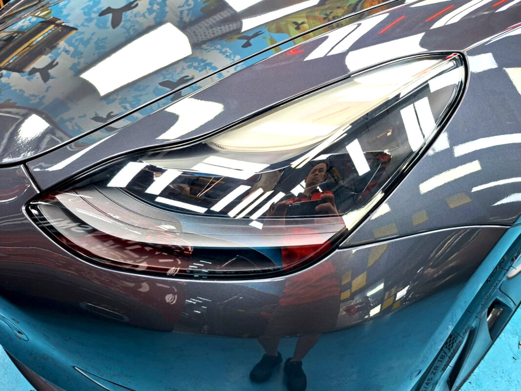 Glossy bodywork of the Tesla Model 3 after coating.