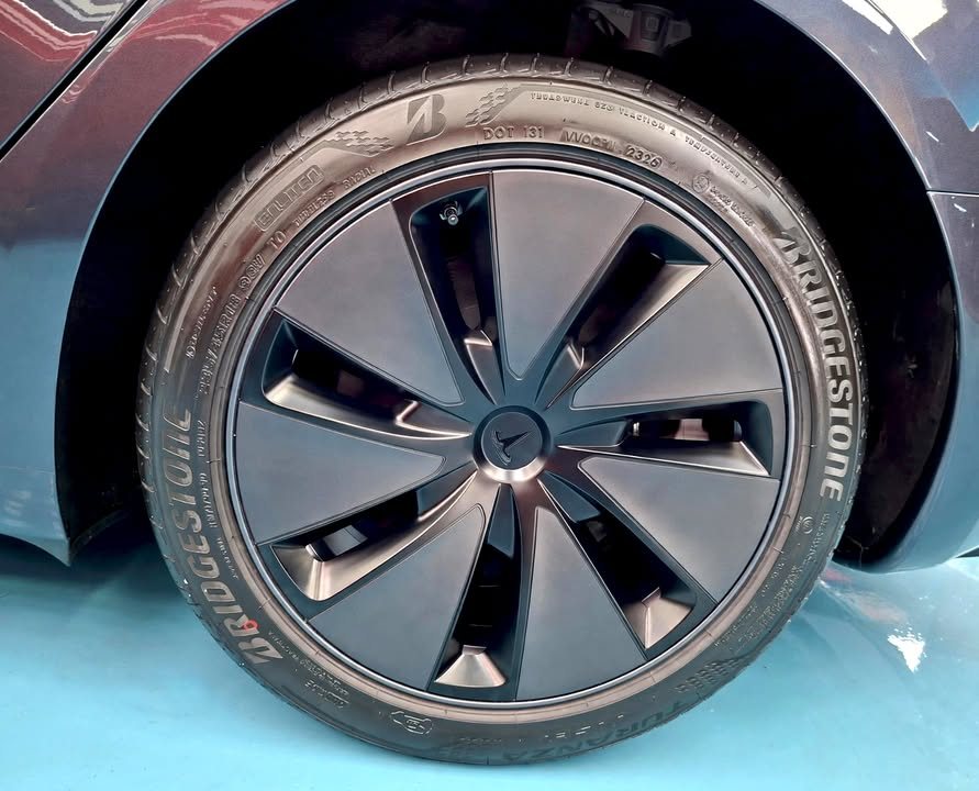 Aero wheel cover and Bridgestone tyre on the Tesla.
