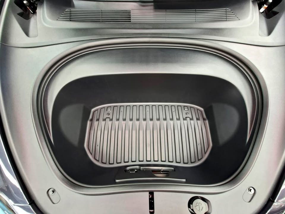 Clean front trunk of the Tesla Model 3 with its liner.