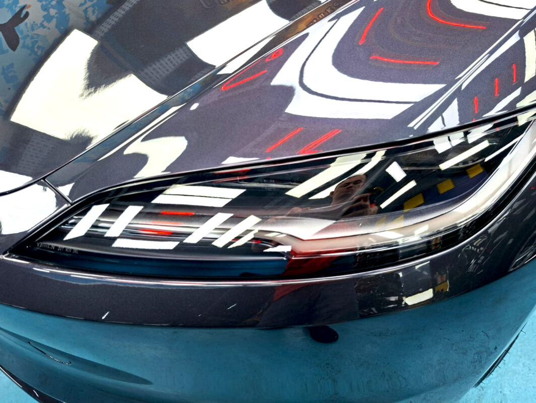 Glossy bodywork of the Tesla Model 3 after coating.
