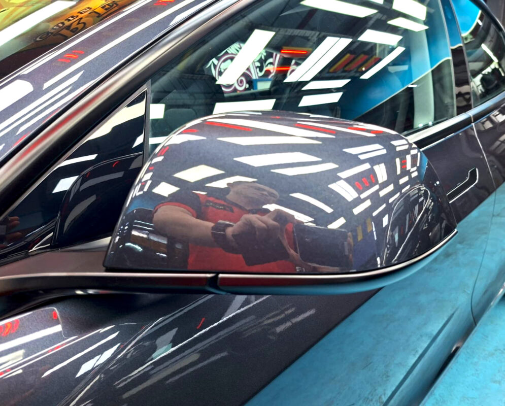 Detailed exterior of the Tesla Model 3.