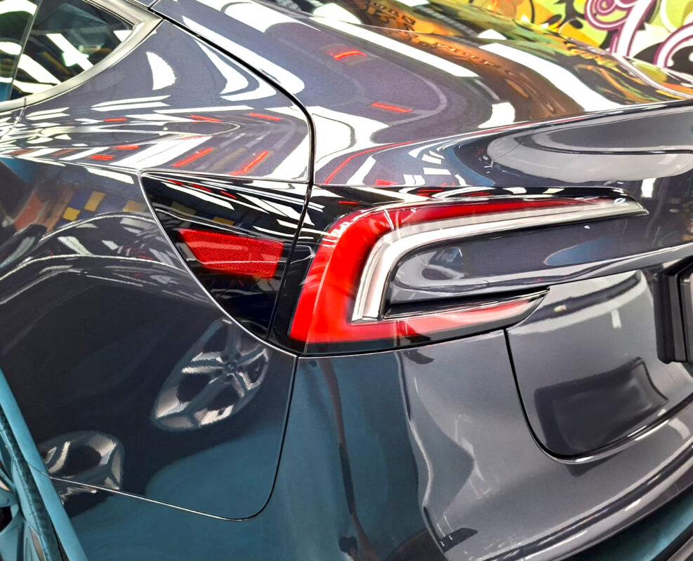The finished Tesla Model 3, glossy and protected.
