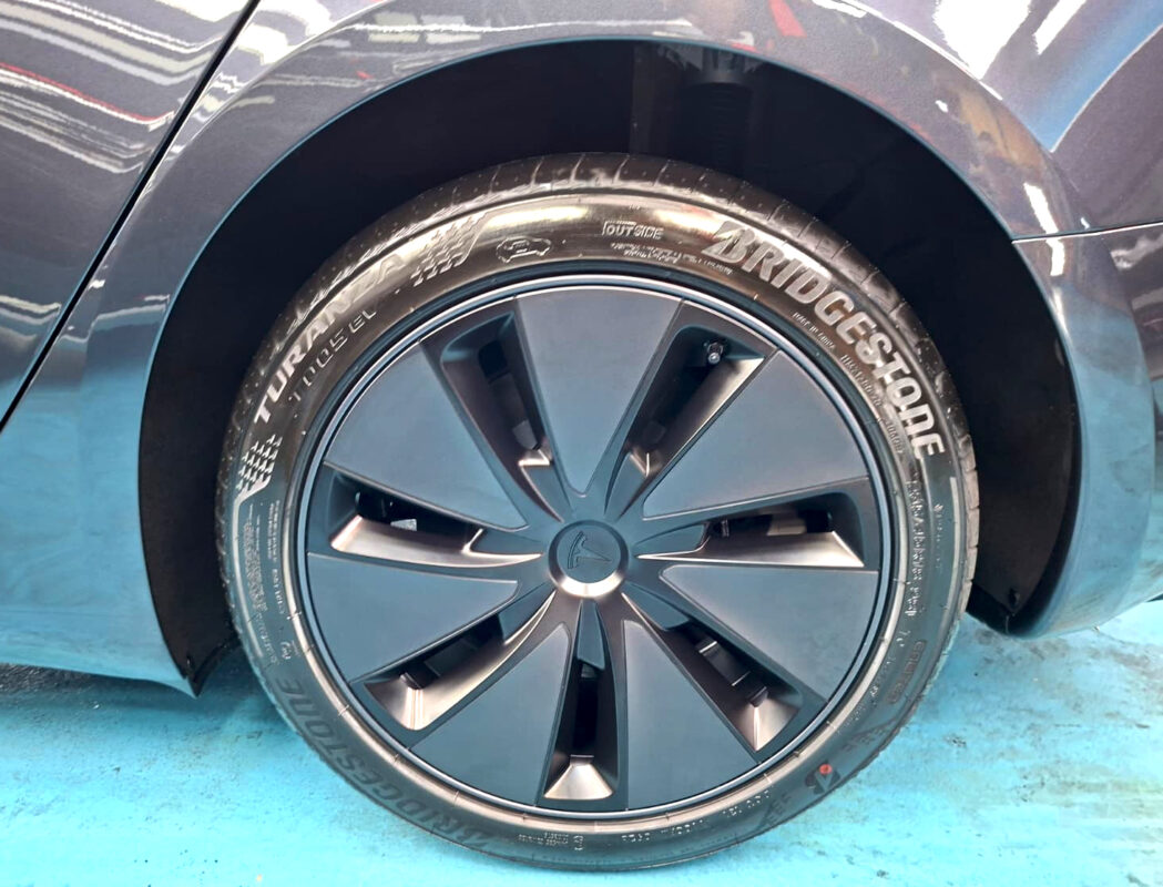 The Tesla Model 3 with its fresh, coated finish.