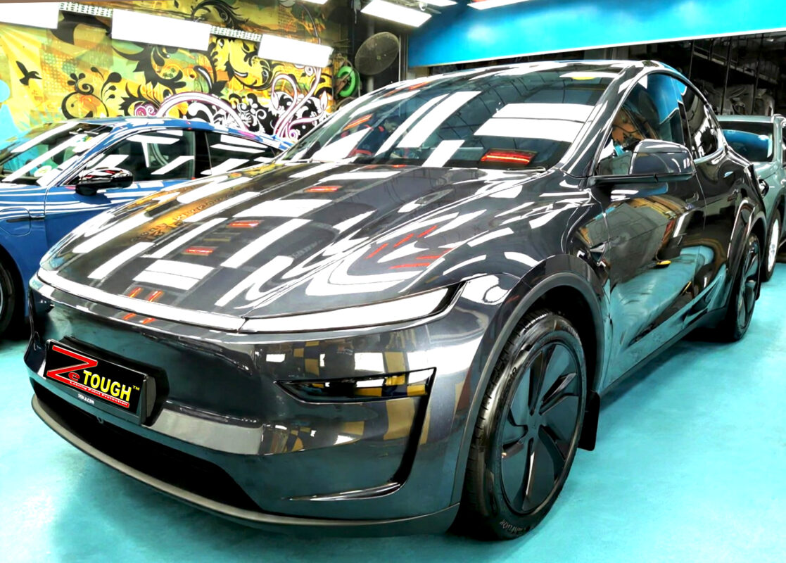 Tesla Model Y, glossy after its ZeTough Ceramic coating.