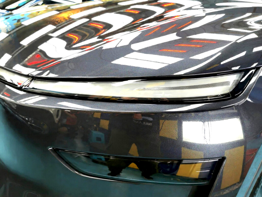Glossy bodywork of the Tesla Model Y after coating.