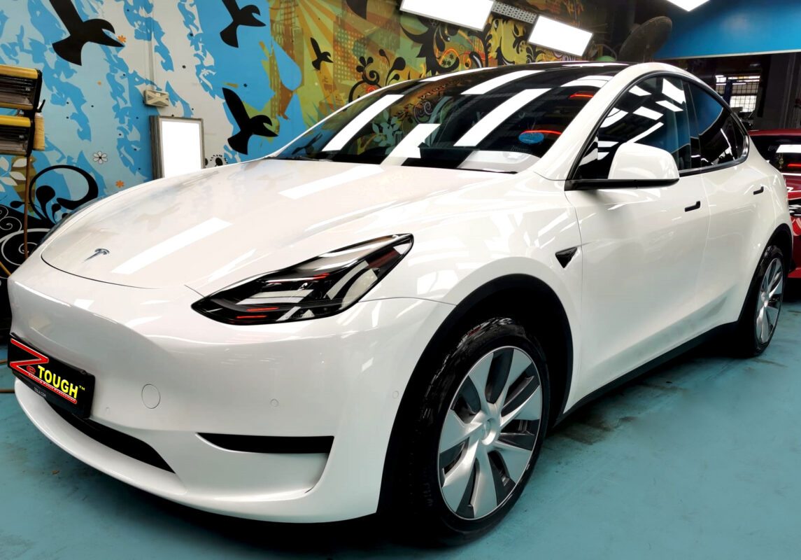 Tesla Model Y, glossy after its ZeTough Ceramic coating.