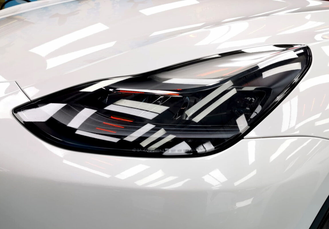 Glossy bodywork of the Tesla Model Y after coating.