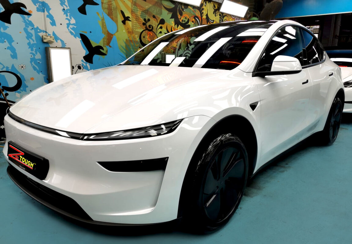 Tesla Model Y, glossy after its ZeTough Ceramic coating.