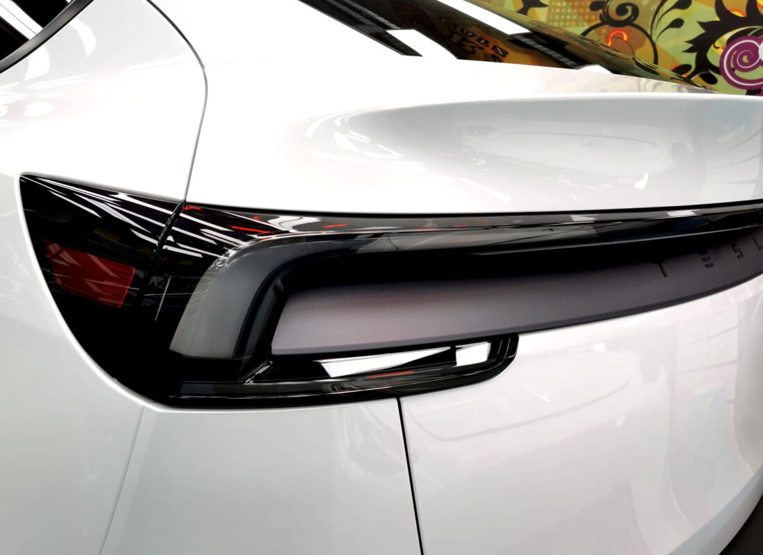 The finished Tesla Model Y, glossy and protected.