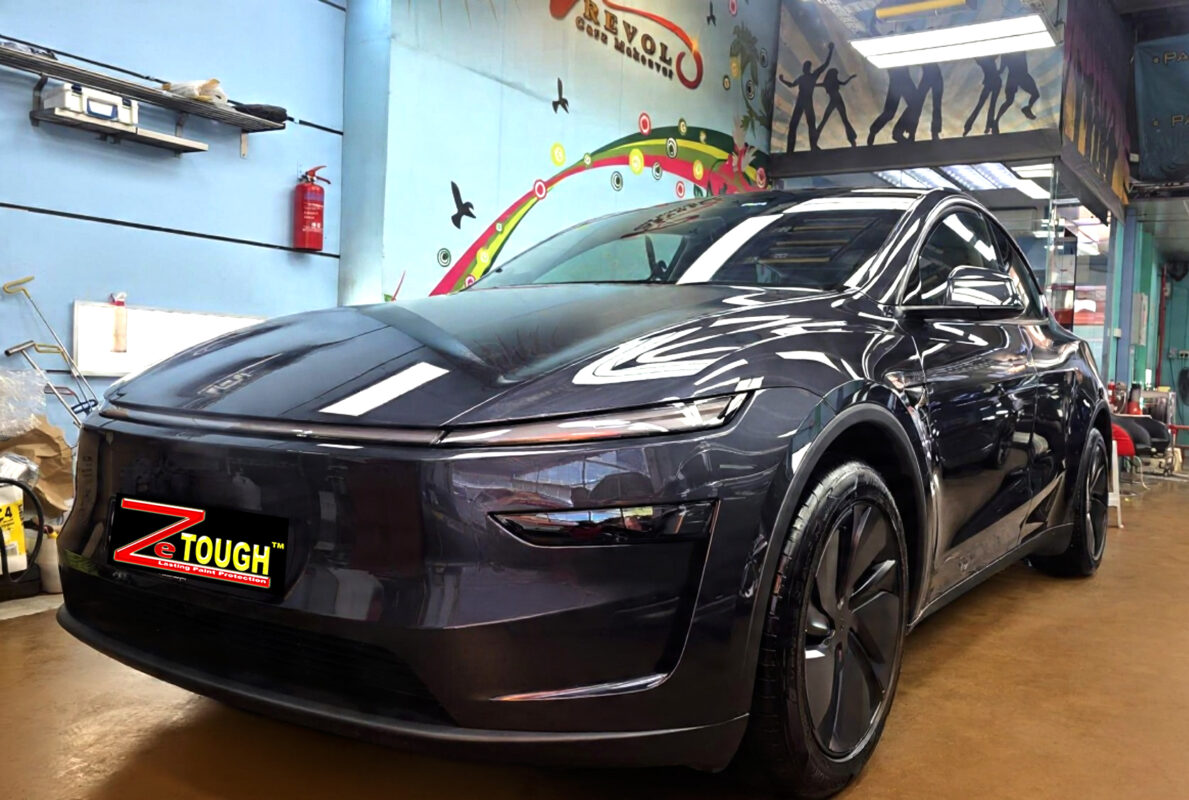 Tesla Model Y, glossy after its ZeTough Ceramic coating.