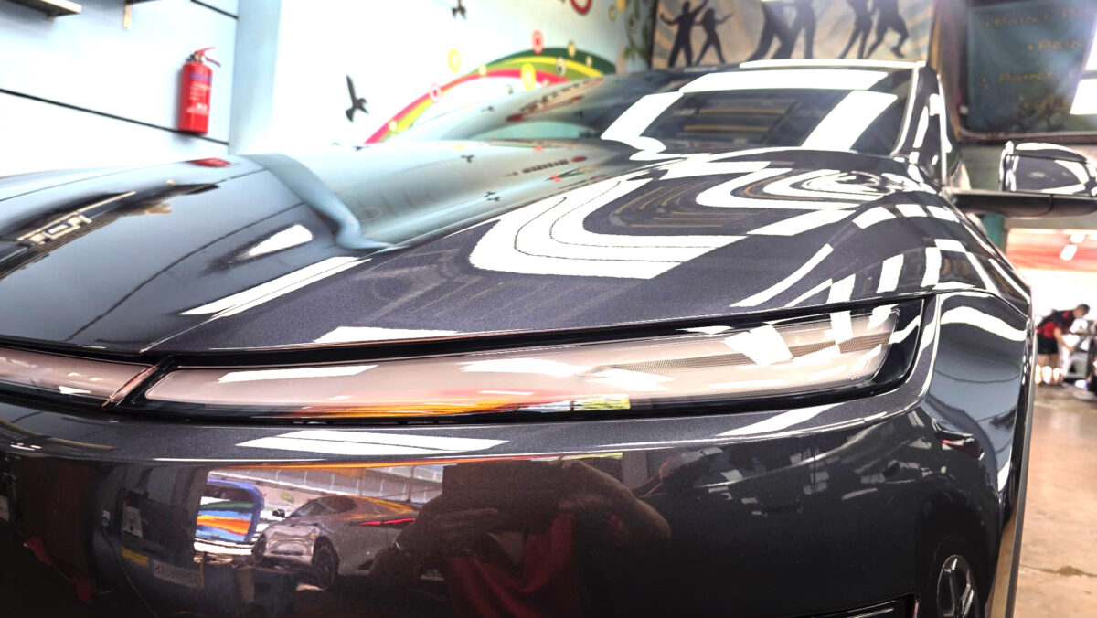 Glossy bodywork of the Tesla Model Y after coating.