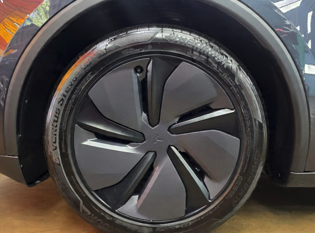 The finished Tesla Model Y, glossy and protected.