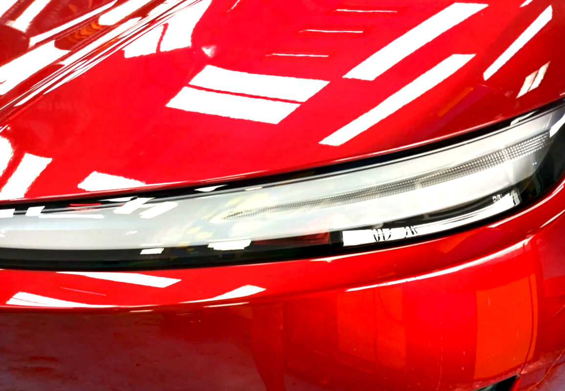 Glossy bodywork of the Tesla Model Y after coating.