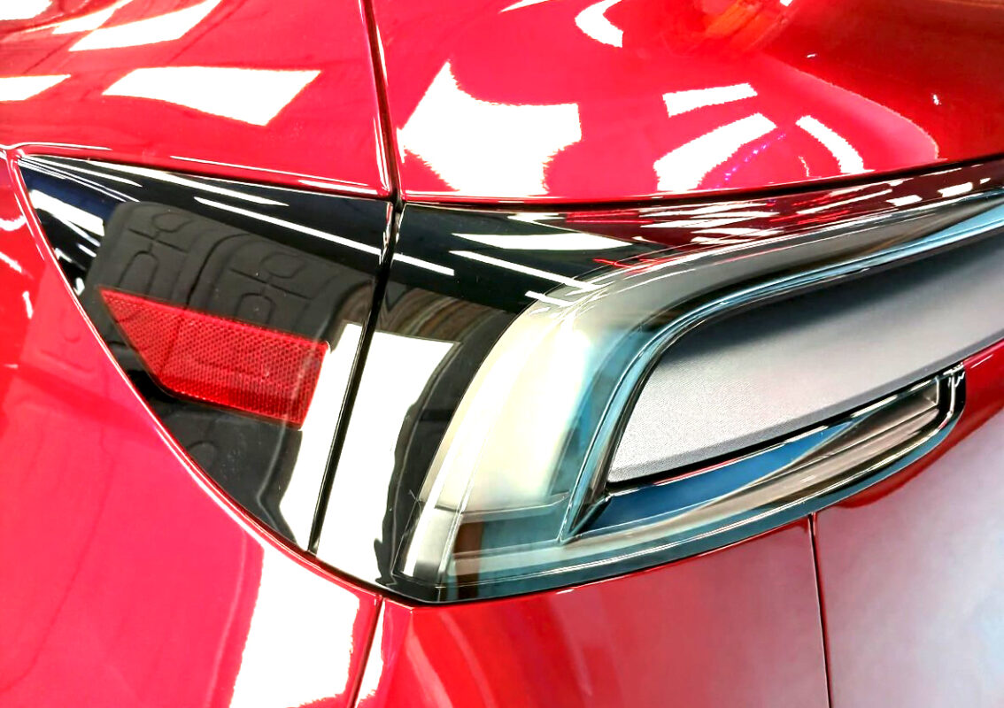 The finished Tesla Model Y, glossy and protected.