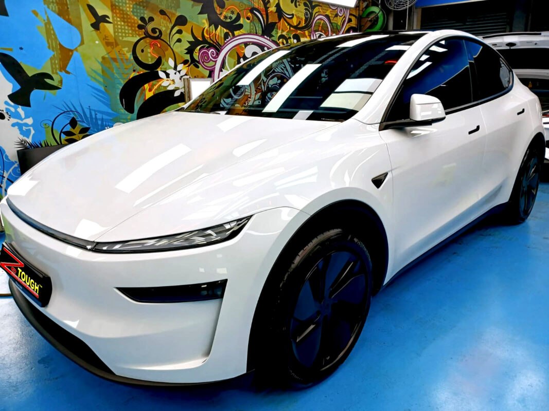 Tesla Model Y, glossy after its ZeTough Ceramic coating.