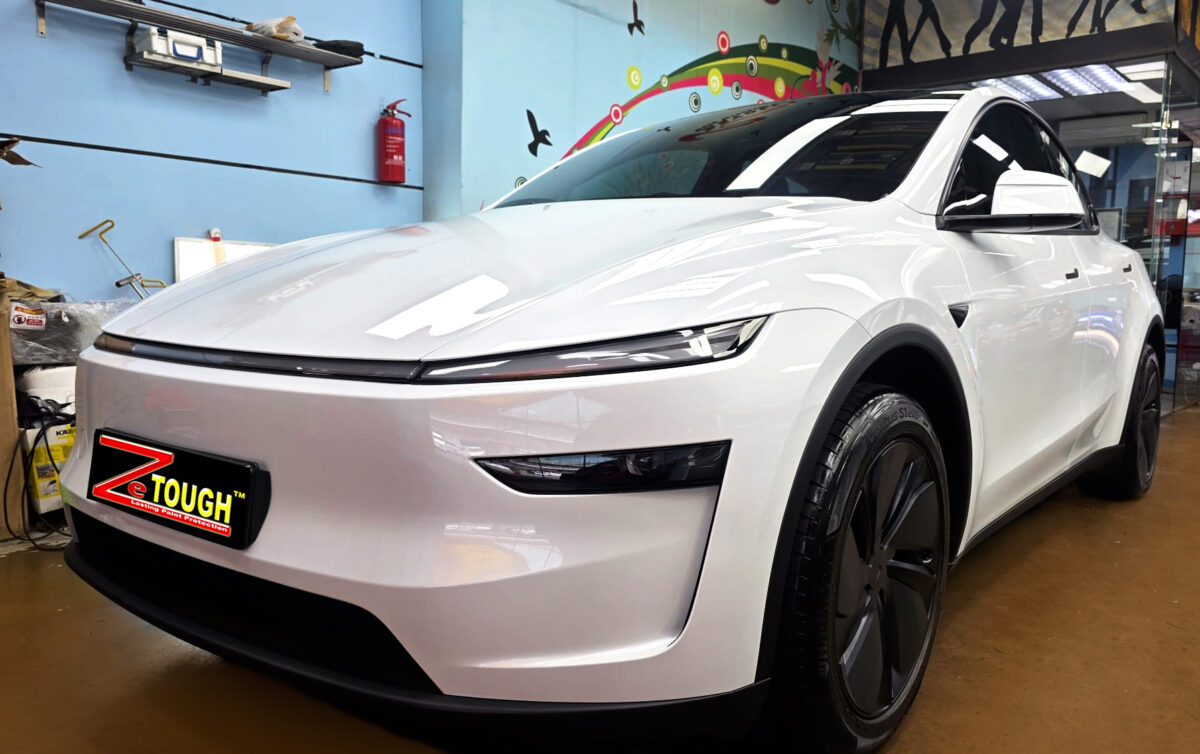 Tesla Model Y, glossy after its ZeTough Ceramic coating.
