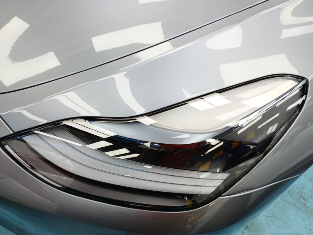 The Model Y's coated paintwork showing clean reflections.