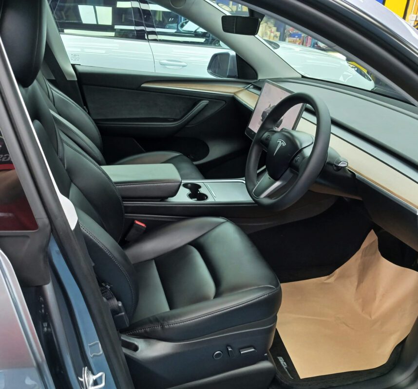 Detail of the Tesla Model Y's bodywork sealed with ZeTough Titanium.