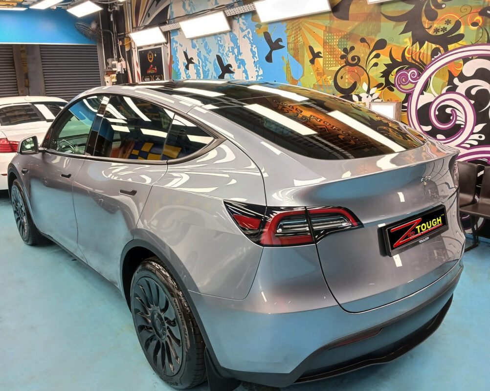 Front three-quarter view of the Tesla Model Y after coating.
