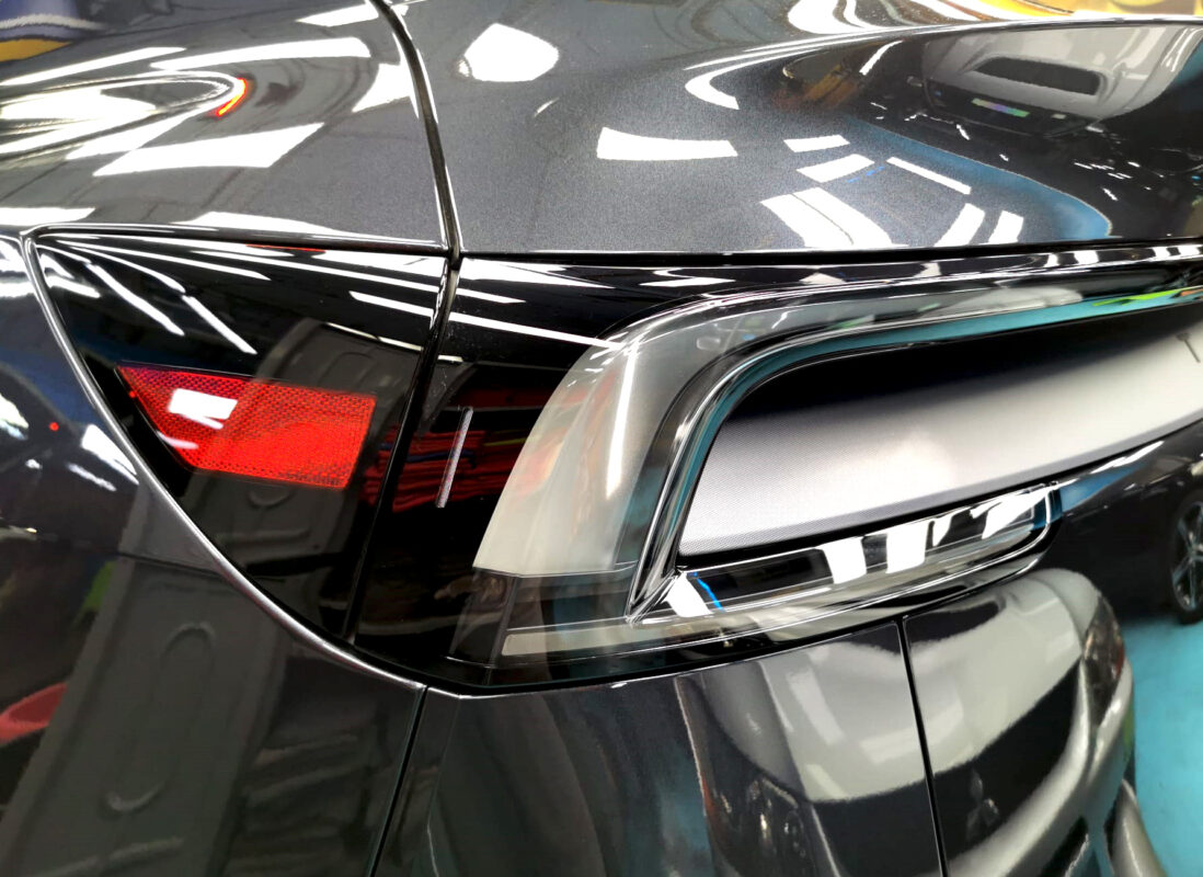 The finished Tesla Model Y, glossy and protected.