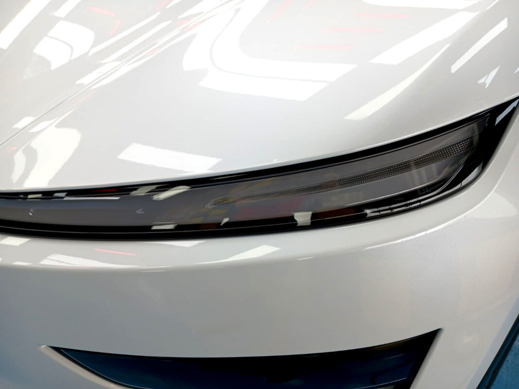 Glossy bodywork of the Tesla Model Y after coating.