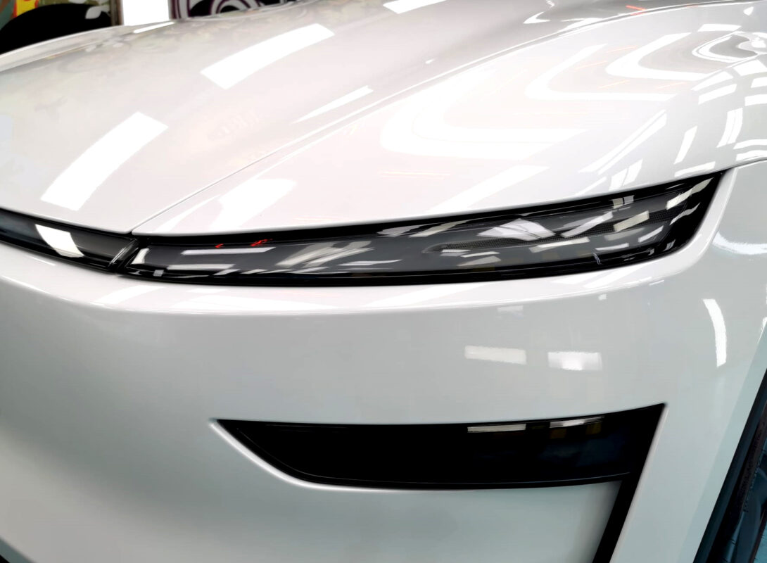 Glossy bodywork of the Tesla Model Y after coating.