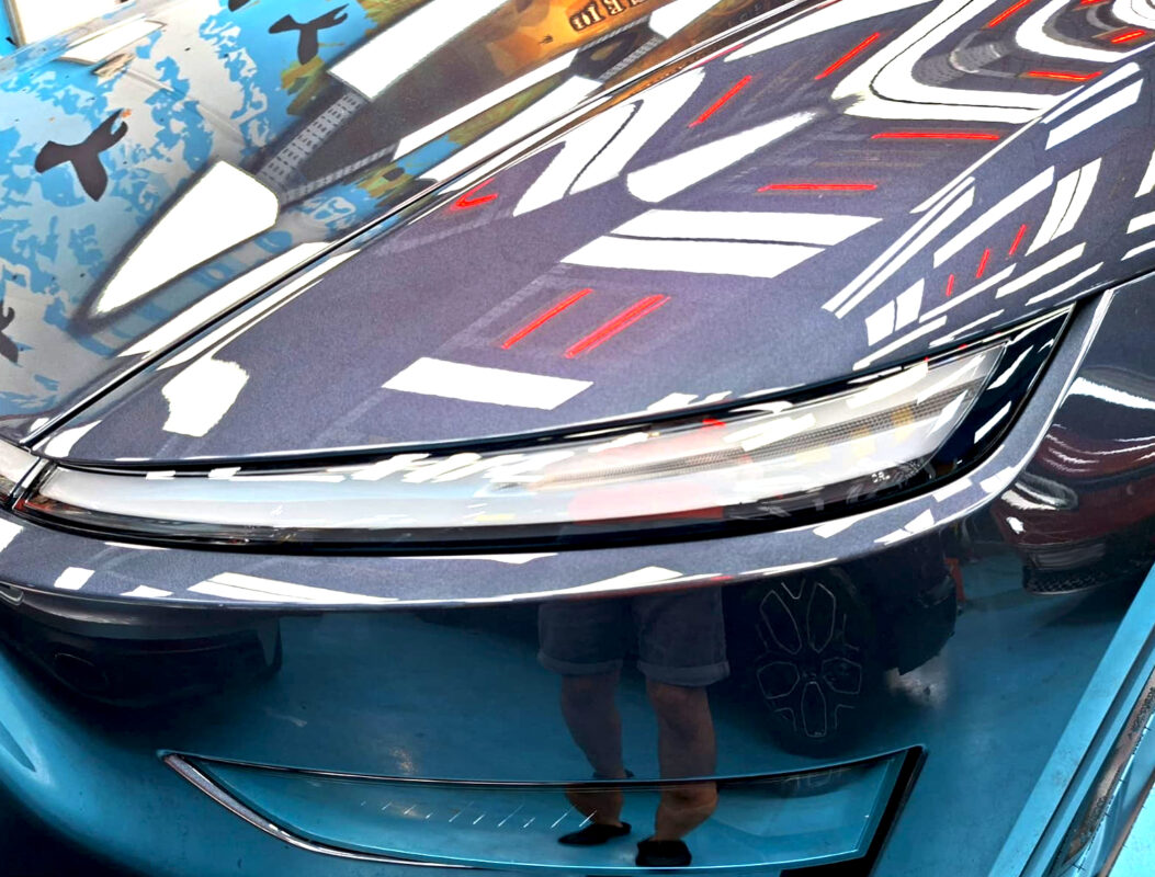 Glossy bodywork of the Tesla Model Y after coating.
