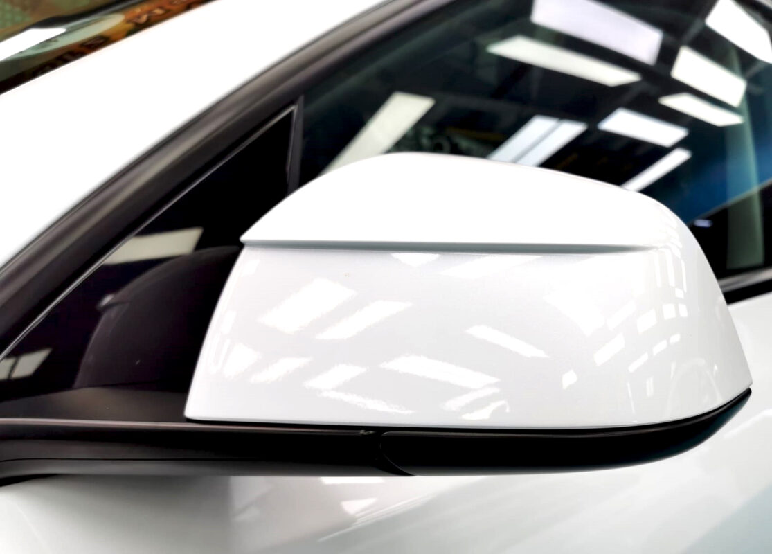 Side panel of the Tesla Model Y with the ceramic finish locked in.