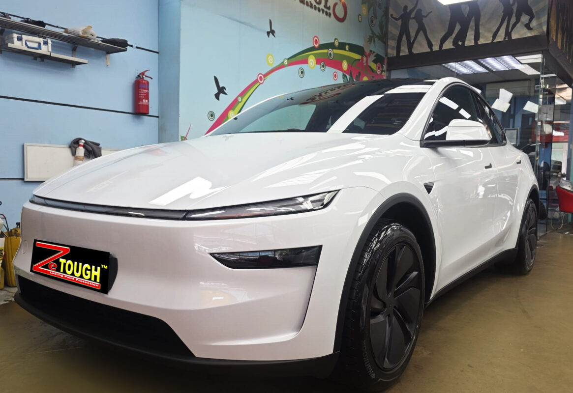 Tesla Model Y, glossy after its ZeTough Ceramic coating.