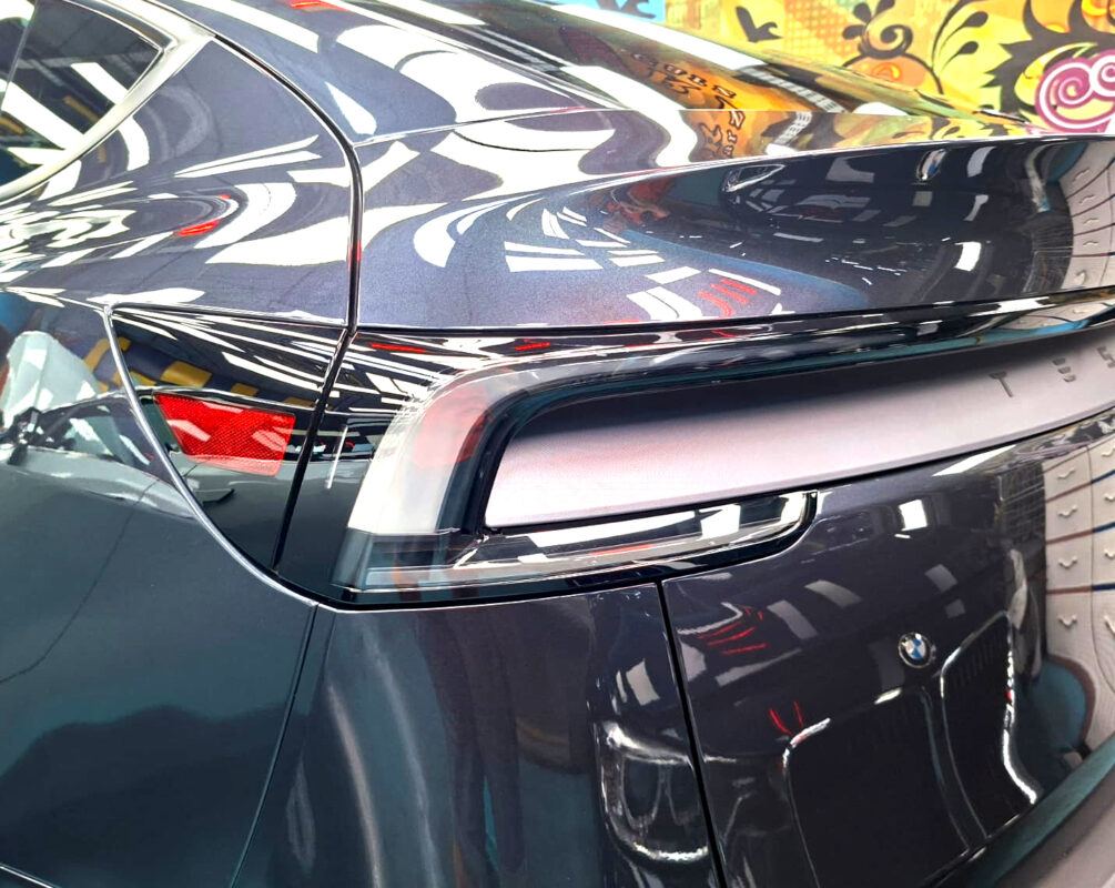 The finished Tesla Model Y, glossy and protected.