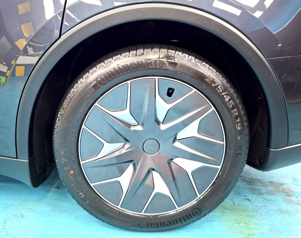 The finished Tesla Model Y, glossy and protected.