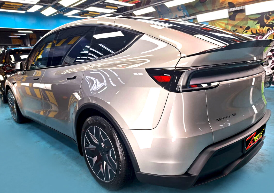 The coated Tesla Model YL with its protected shine.