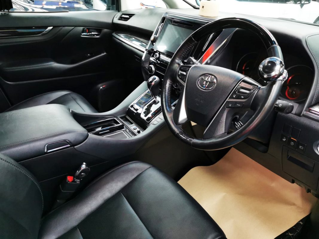 The Toyota Alphard parked in the workshop, freshly coated.
