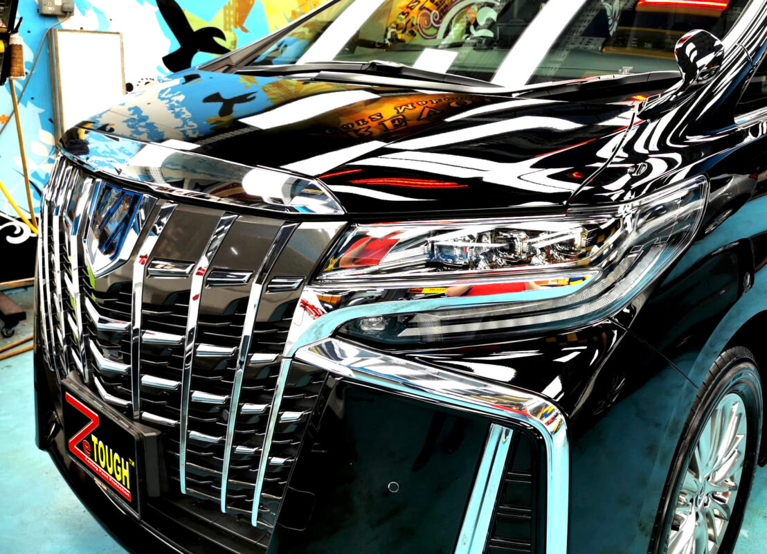 The Toyota Alphard from a side angle after the titanium coating.