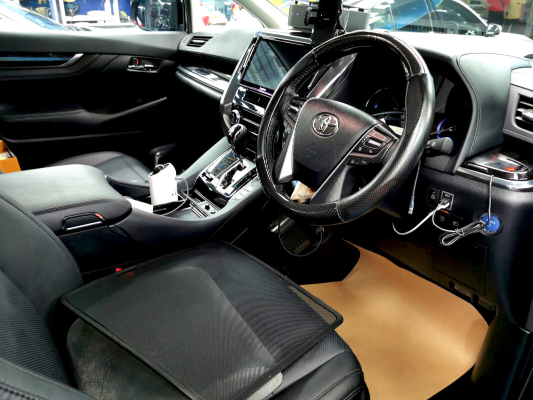 The Toyota Alphard parked in the workshop, freshly coated.