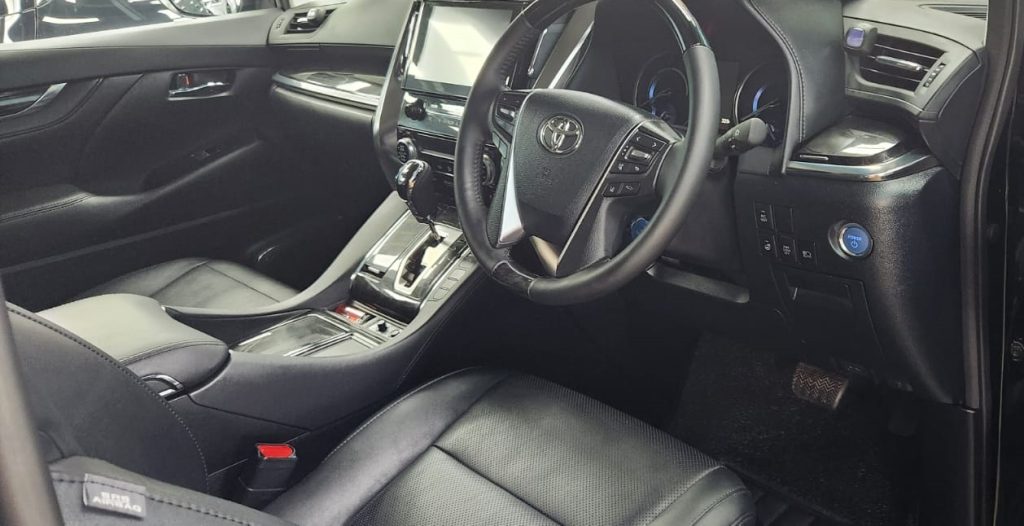 The Toyota Alphard parked in the workshop, freshly coated.