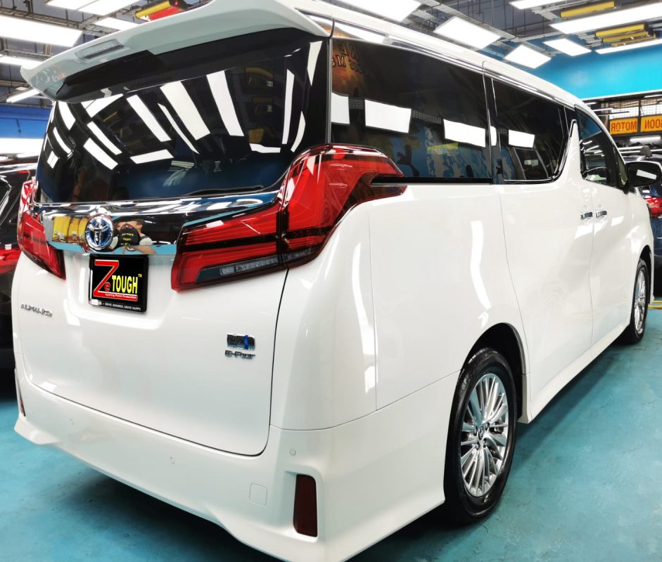 Rear quarter of the Toyota Alphard, glossy and protected.