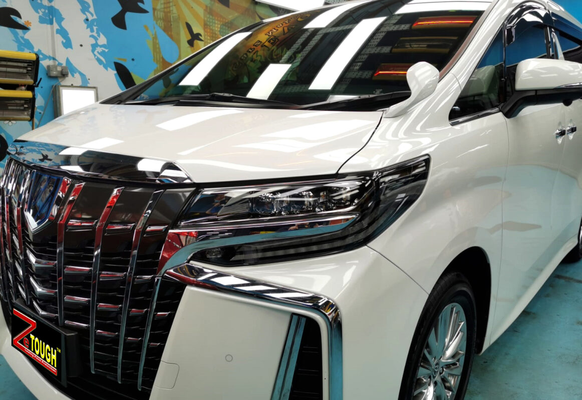 The Toyota Alphard from a side angle after the ceramic coating.