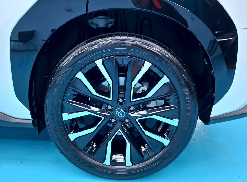Two-tone alloy wheel with a Toyota centre cap.