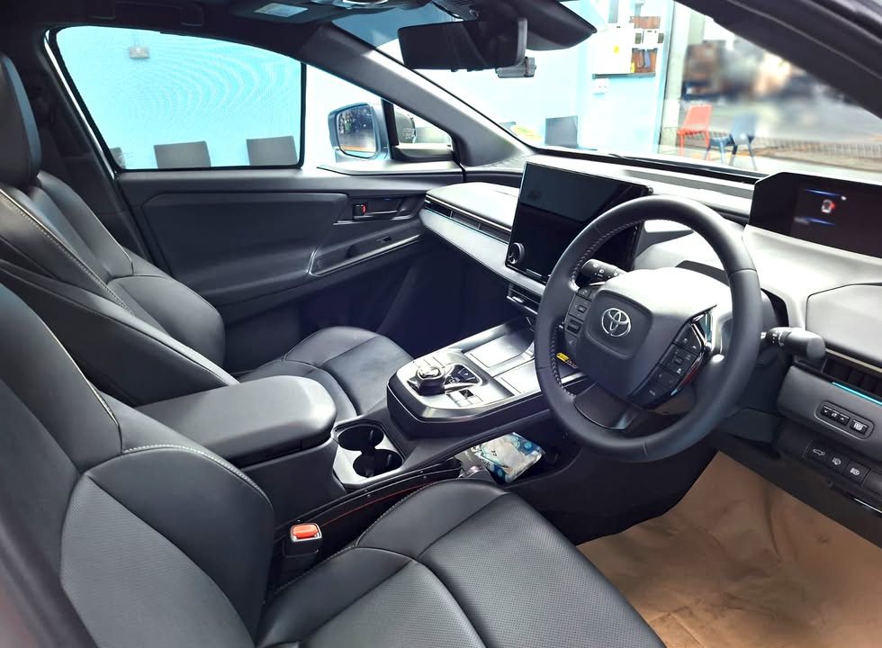 Toyota bZ4X front cabin with grey seats and the centre screen.
