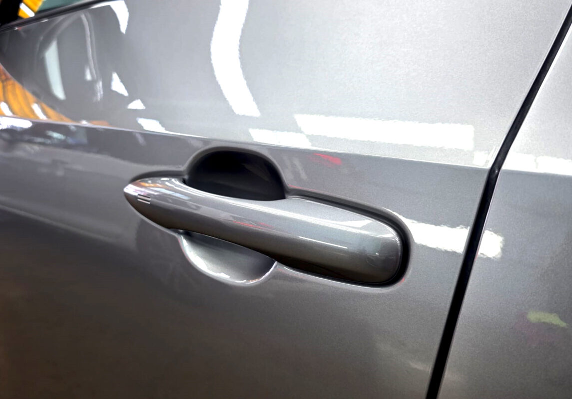 The coated paintwork of the Toyota bZ4X, clean and sharp.