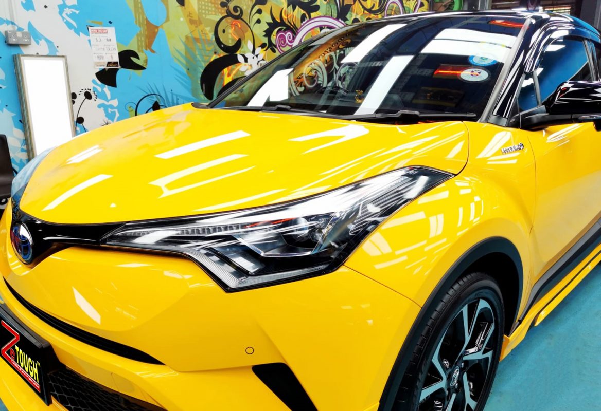 The Toyota C-HR Hybrid from a side angle after the titanium coating.