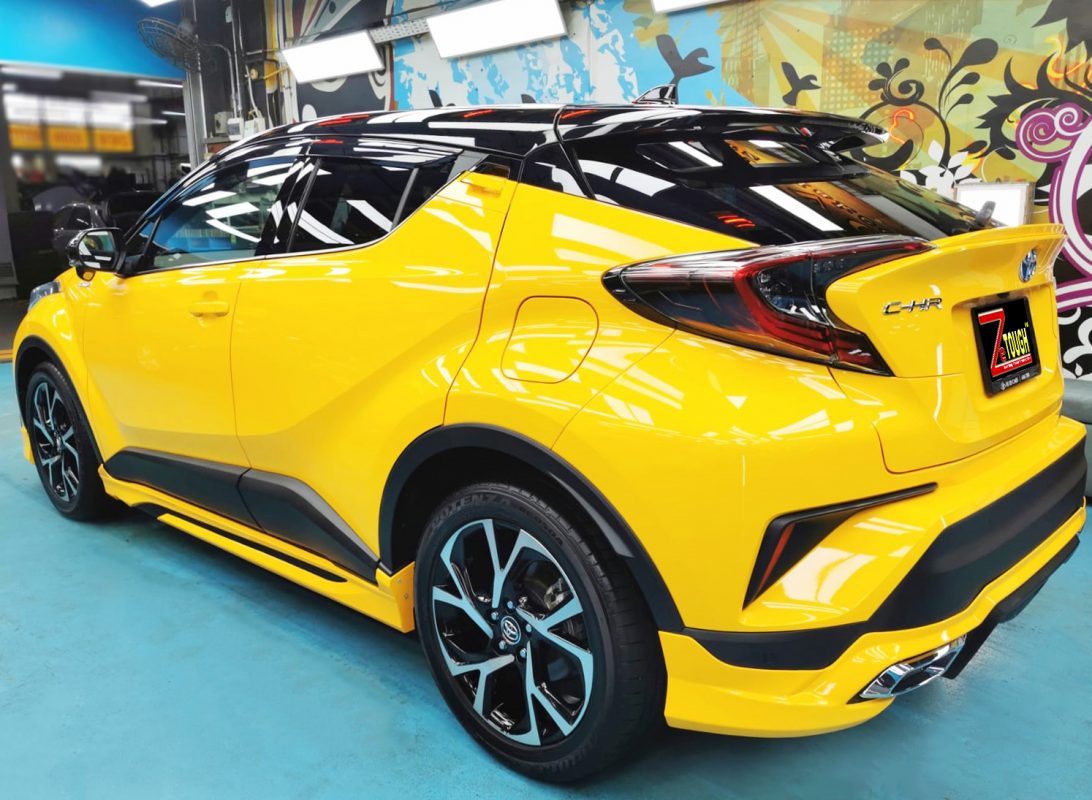 Rear quarter of the Toyota C-HR Hybrid, glossy and protected.
