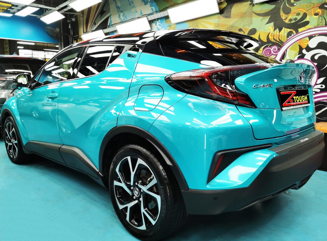 Rear quarter of the C-HR, glossy and protected.