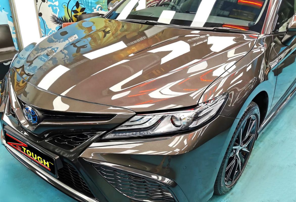 The Toyota Camry from a side angle after the titanium coating.
