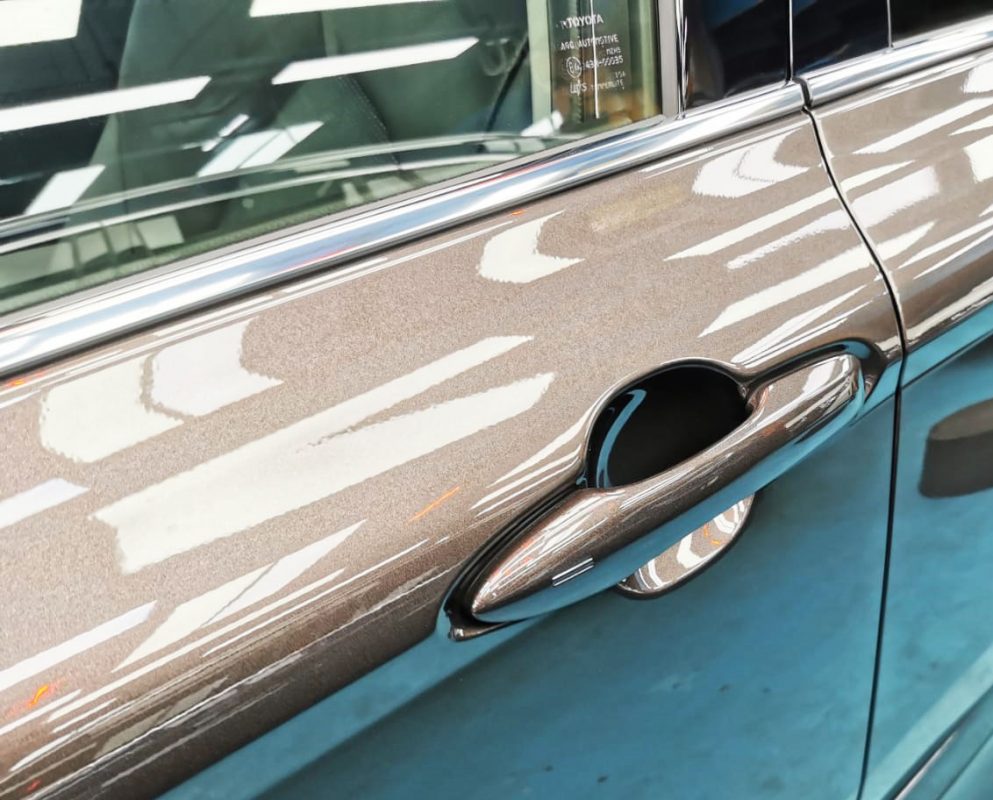 Side panel of the Toyota Camry with the titanium finish locked in.