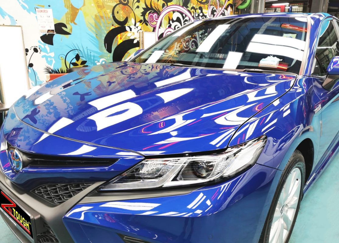 The Toyota Camry Hybrid from a side angle after the titanium coating.